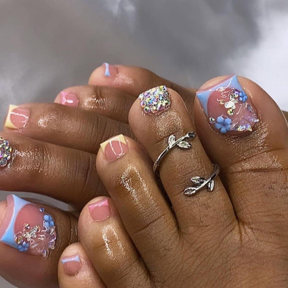 Colorful French Tip Press On Toenails Nude Pink Blue Yellow Short Squoval Glossy 3D Butterfly Flower Rhinestone Full Cover Fake Toenails Reusable Pedicure Nails Kit 149
