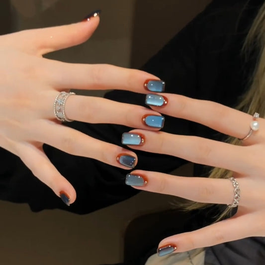 Blue Cat Eye Press-On Nails – Icy Blue Squoval Nails with Caramel Brown French Tip & Rhine 287